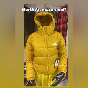 Brand new North face jacket size small with tags
